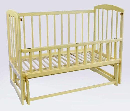 Дитяче ліжечко дерев'яна маятник з відкидним бортом "Спимо" вільха - колір слонова кістка