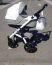 Універсальна дитяча коляска-трансформер Bellini з модульною системою 2в1 біла із сірим
