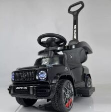 Дитяча каталка толокар M 5795AL-2 Машина з батьківською ручкою, шкіряне сидіння, MP3, USB, bluetooth, чорна