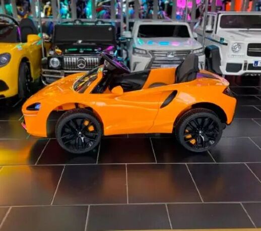 Дитячий електромобіль Легкова Машина McLaren M 5030 Помаранчеве Автофарбування