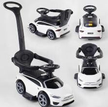 Дитяча каталка толокар Машина JOY TS 7119 W з батьківс.ручкою та муз. рулем / РОСІЙСЬКЕ ОЗВУЧУВАННЯ / біла